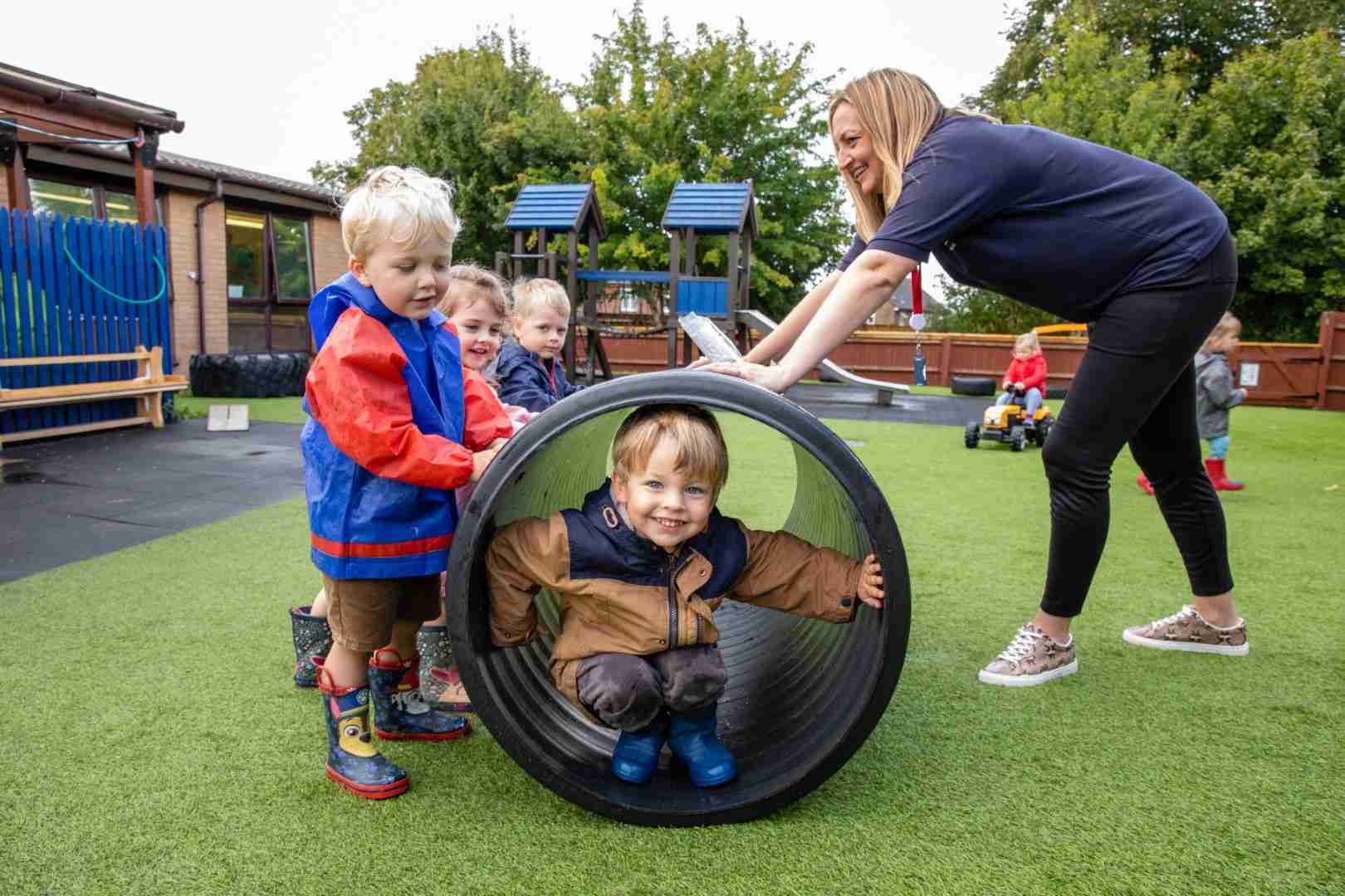 Children playing outside at RAFAKidz Odiham Children playing outside at RAFAKidz Odiham